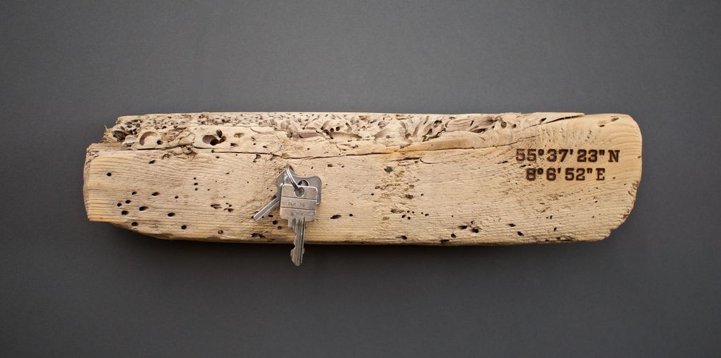 Magnetic Driftwood Board 55° 37' 23" North 8° 6' 52" East made from driftwood found on the beach in Denmark, North Sea. To use as a magnetic board for keys, knives, photos or pictures.