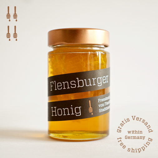 Flensburger Honig mit Wabe, Presshonig von Flensburger Stadtbienen mit Wabenstück aus Naturwabenbau, naturbelassener Stadthonig mit Wabenhonig